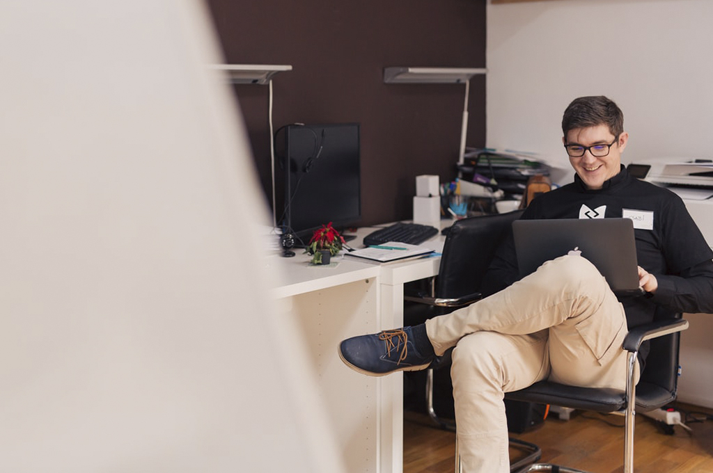 man studying on chair